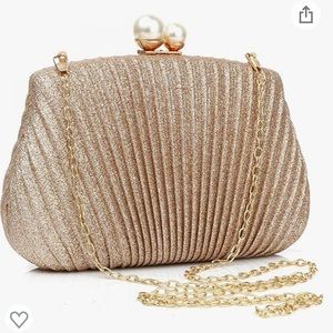 woman’s shell clutch shell beads formal evening bag